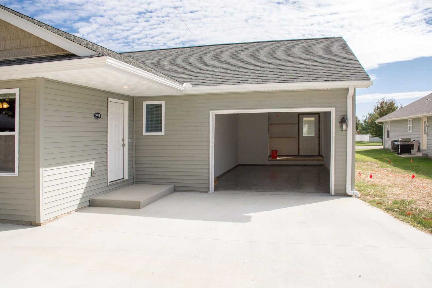 haubstadtduplexfontelevationgarage