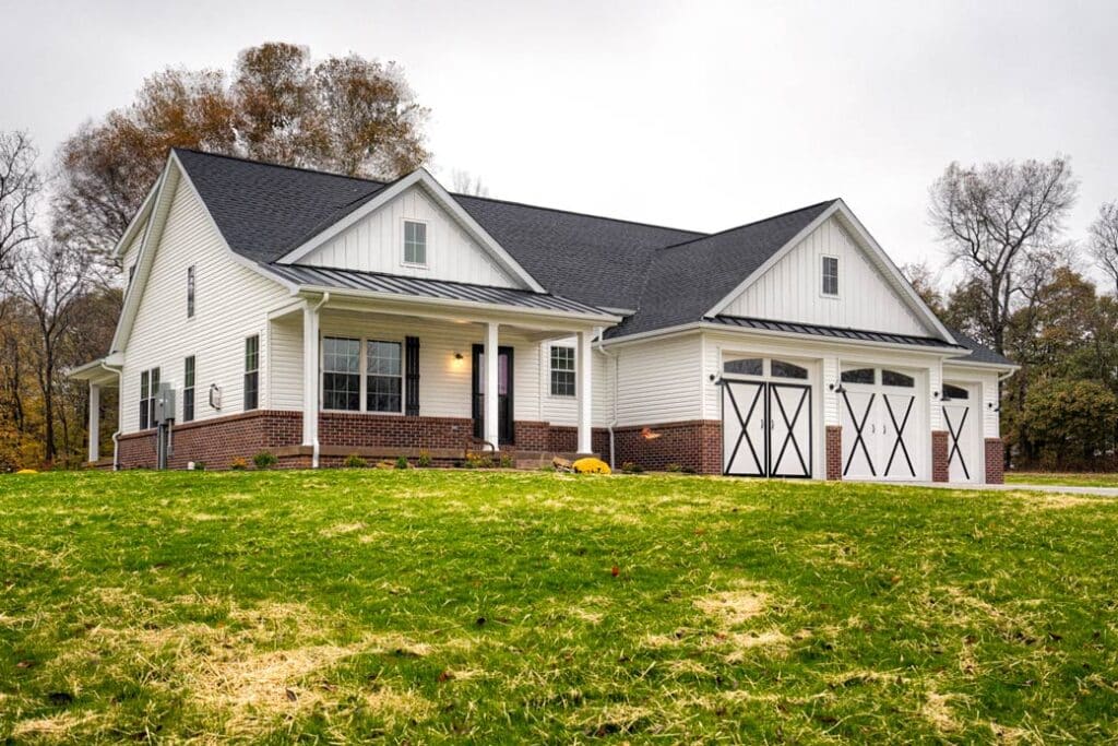 Charming modern home with a large yard and attractive exterior design.