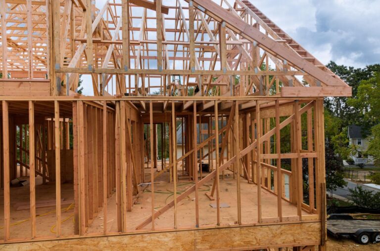 Residential framing work showcasing construction progress and future home design.