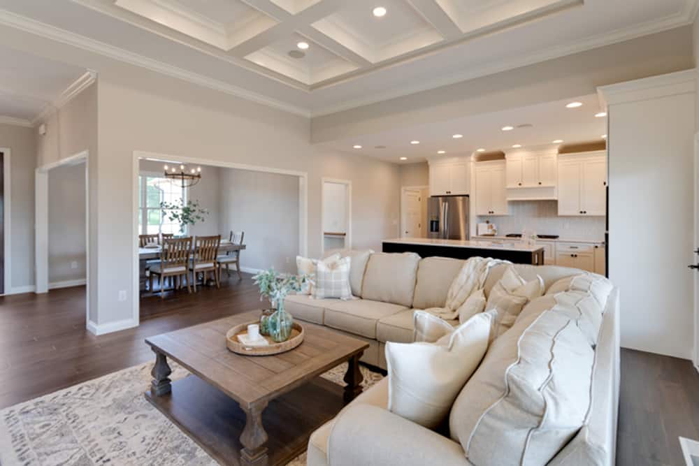 Stylish modern living room with cozy seating and elegant decor elements.