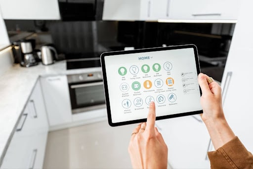 Smart home control panel displayed on tablet for managing kitchen appliances and settings.