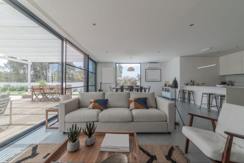 Bright open concept living room with stylish decor and abundant natural light.