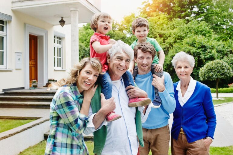 Family enjoying fun moments together in a sunlit garden.