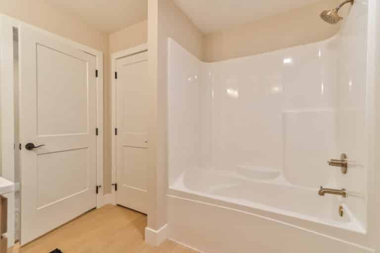 Modern bathroom shower corner with sleek design and stylish fixtures for ultimate relaxation.