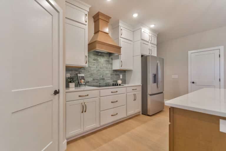Sleek modern kitchen design featuring stainless steel appliances and stylish cabinetry.