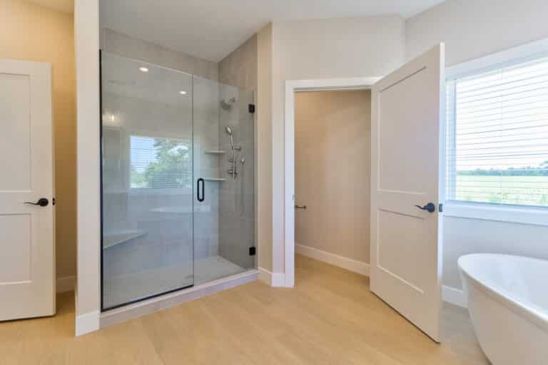 Sleek modern shower design featuring glass enclosure and contemporary fixtures for a stylish bathroom.