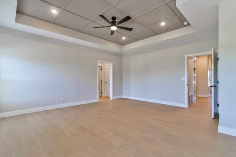 Stylish, spacious modern room with natural light and contemporary design features.