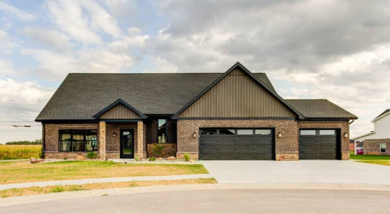 Stylish modern brick home with a spacious garage in a vibrant neighborhood.