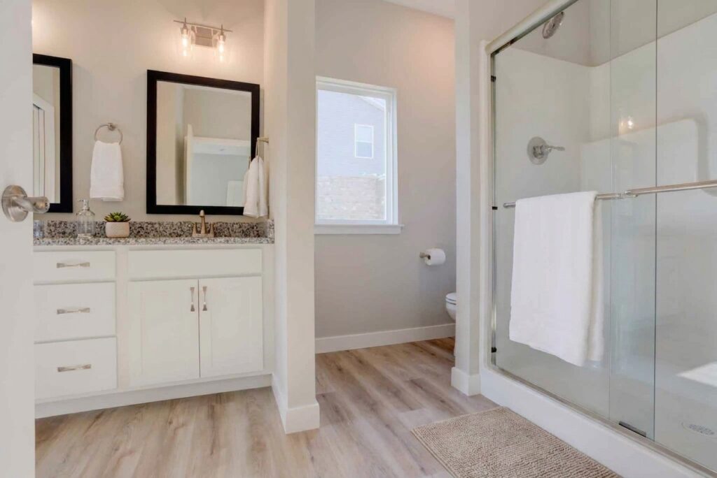 Modern bathroom interior featuring sleek design, elegant finishes, and natural light.