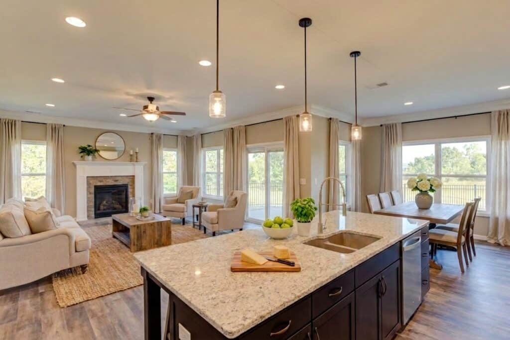 Stylish modern kitchen with open layout, elegant decor, and ample natural light.