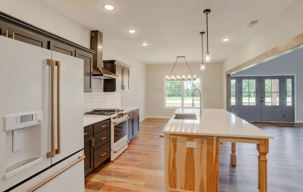 Stylish modern kitchen featuring elegant cabinetry and bright, inviting natural light.
