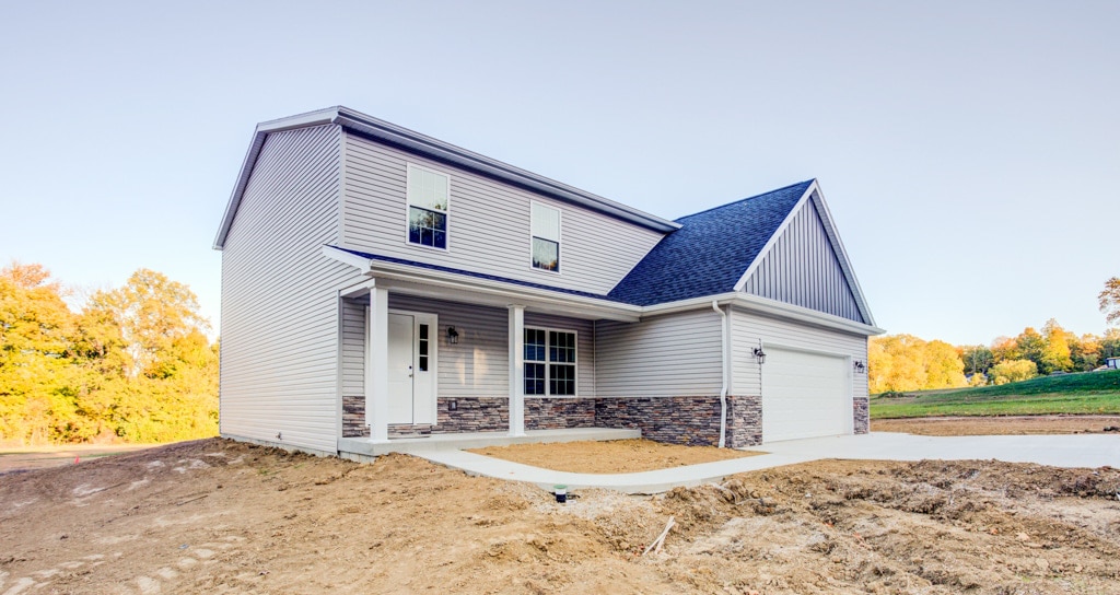 Stylish new home construction with modern design and open surroundings.